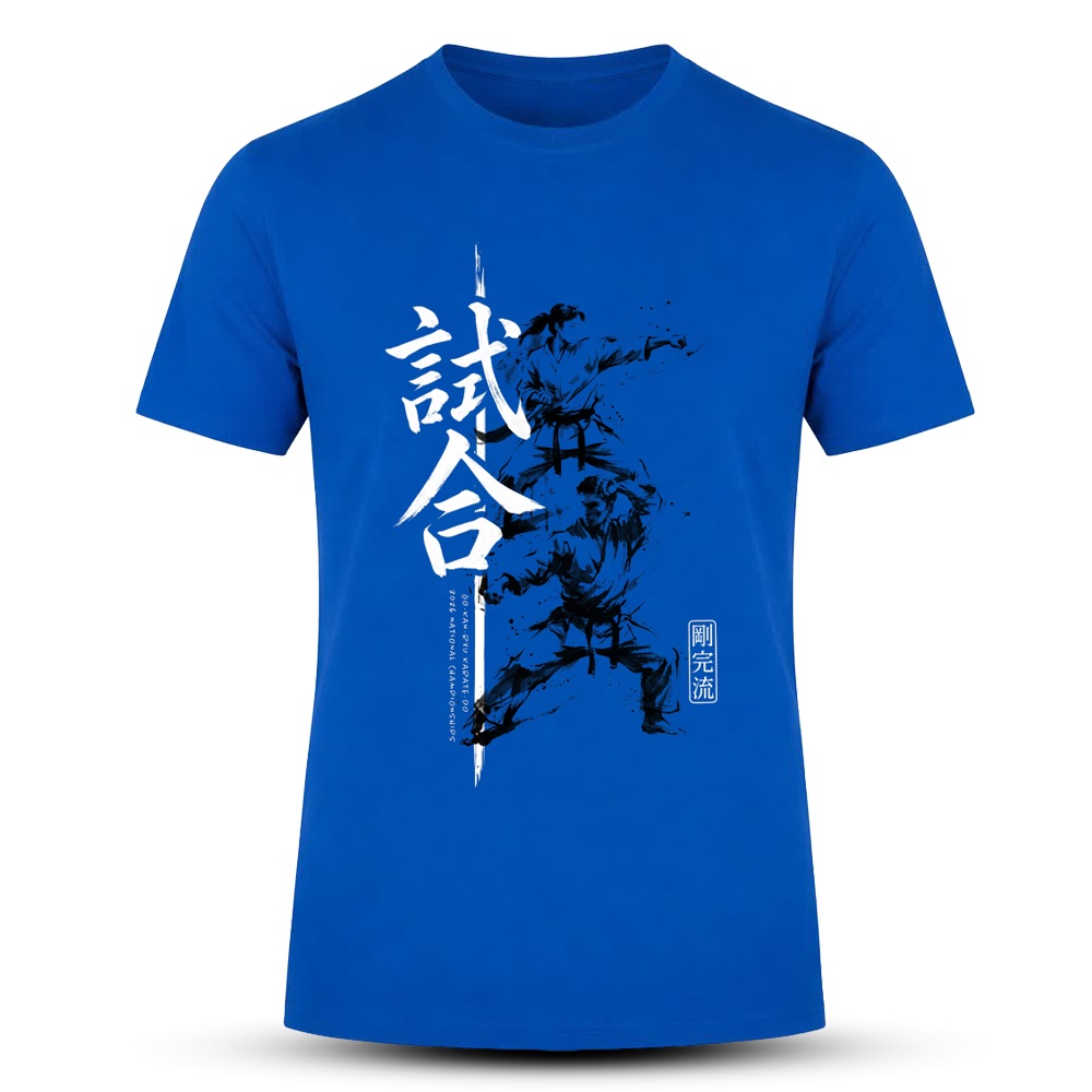 The 2026 National Champs tee in royal blue, printed with brushed Japanese calligraphy and two karateka mid-technique.